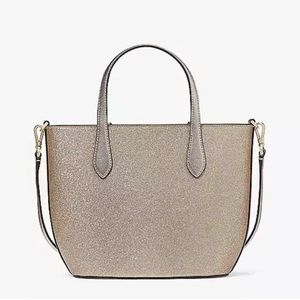 NWT in original plastic Kate Spade Glimmer Glitter large purse tote w/ bag
